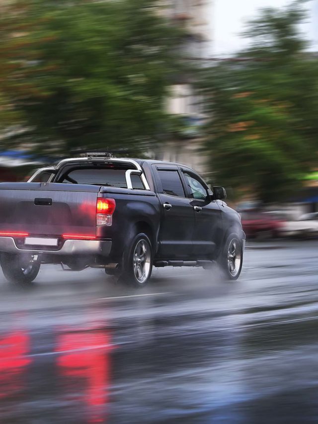 cropped-pickup-truck-rainy-street.jpg